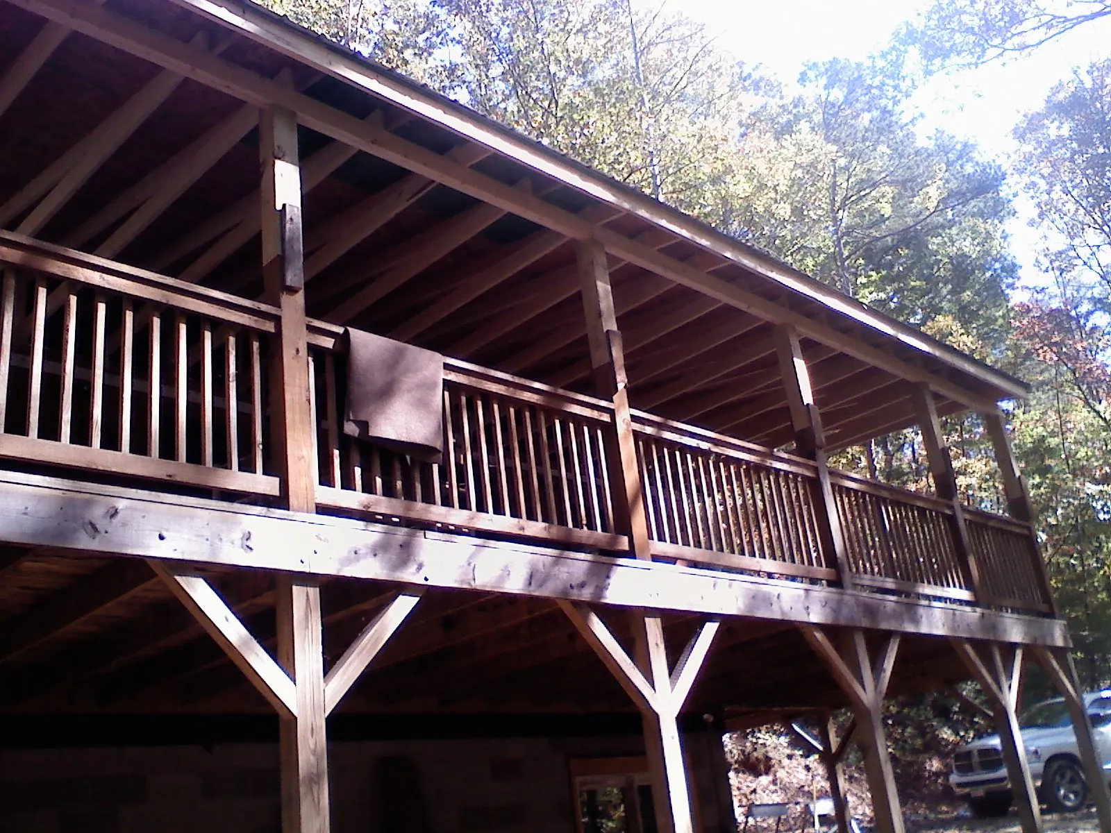 Timber framing under a new elevated porch and deck — Roof Leak Repair in Rego Park by Roofing Brothers